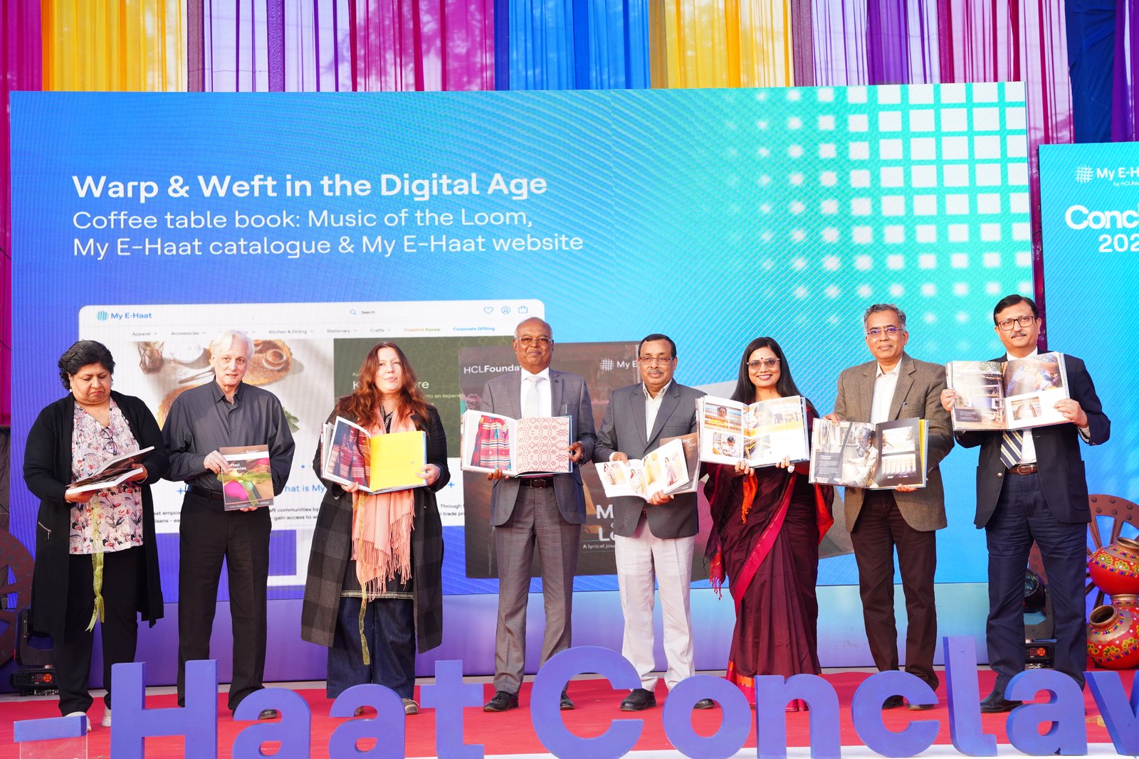 Launch of a coffee table book celebrating India’s rich handicraft tradition at HCLFoundation-hosted My E-Haat Conclave at Noida Haat in Noida, on December 12, 2025