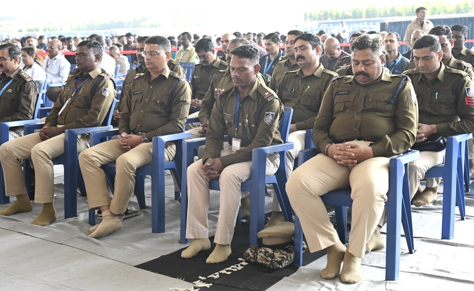 Police officials practicing Heartfulness meditation as part of the ‘One World, One Heart’ event